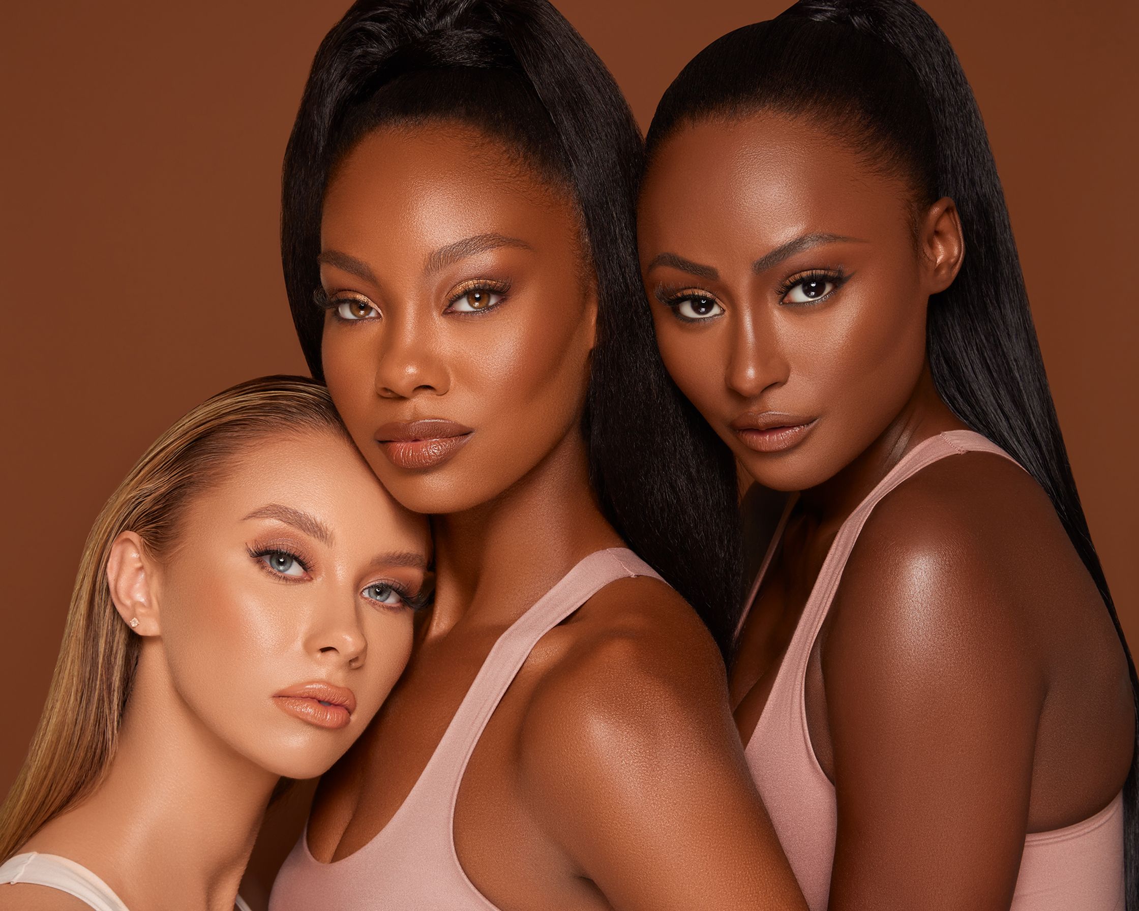 three black women posing for a photo