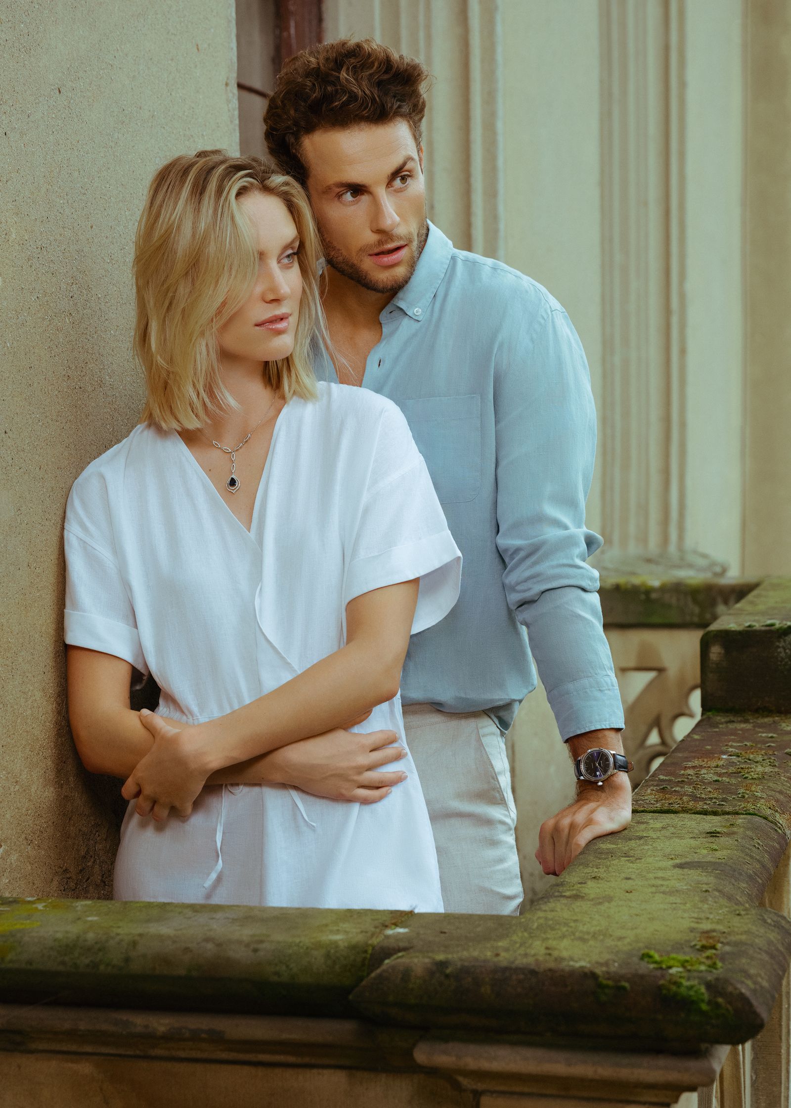 a man wearing a white shirt and a woman wearing a white shirt