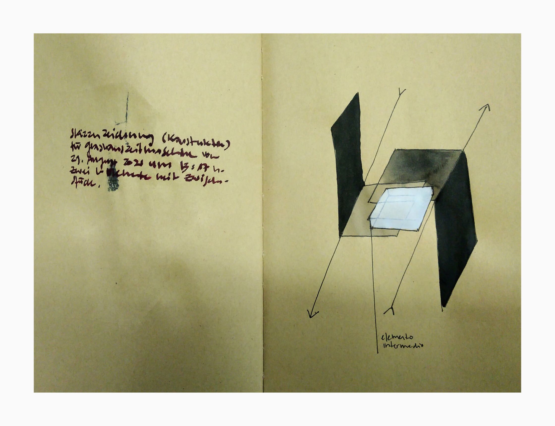 an open book with a drawing of a square and a triangle