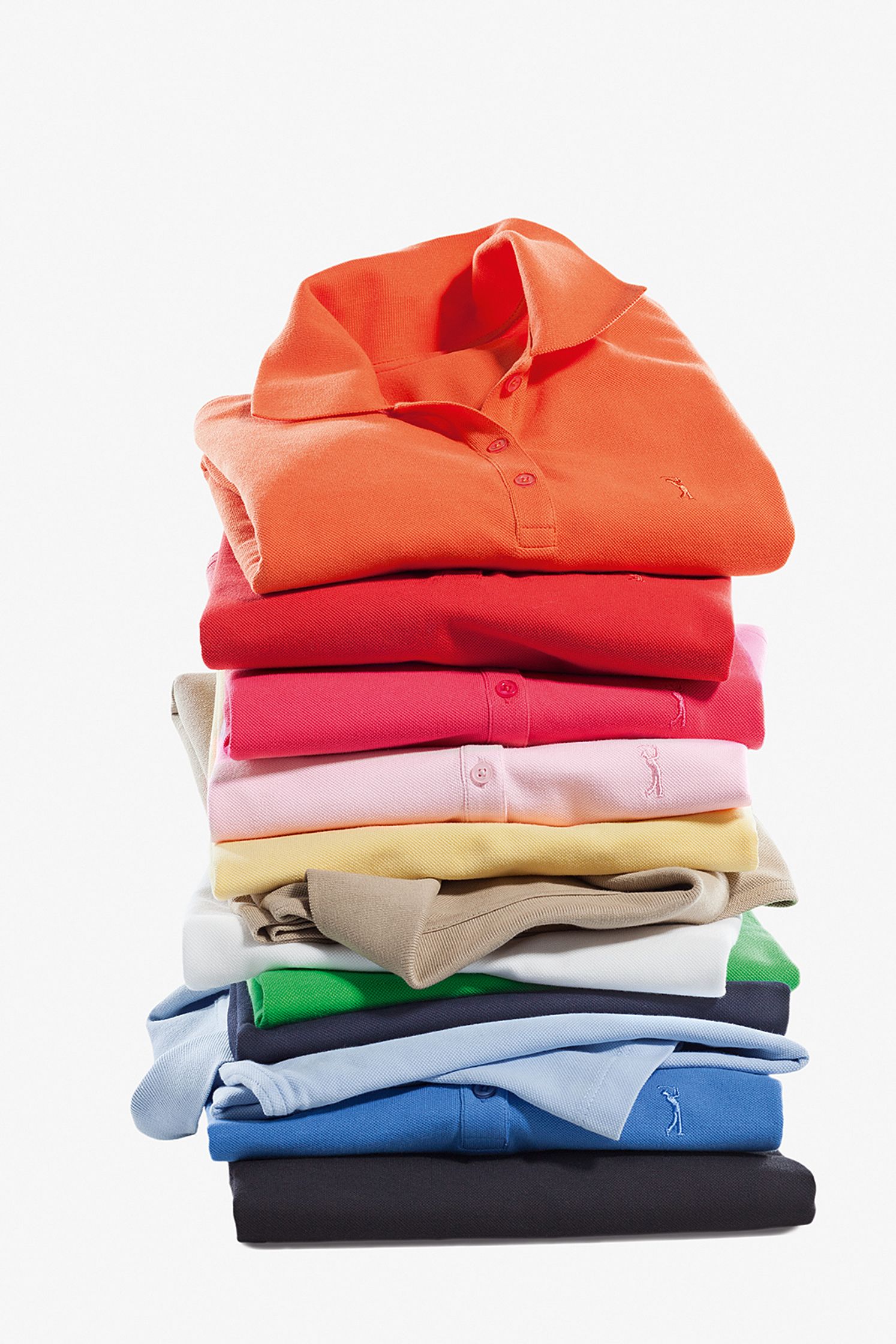 a stack of colorful polo shirts on a white background Post Production Hamburg