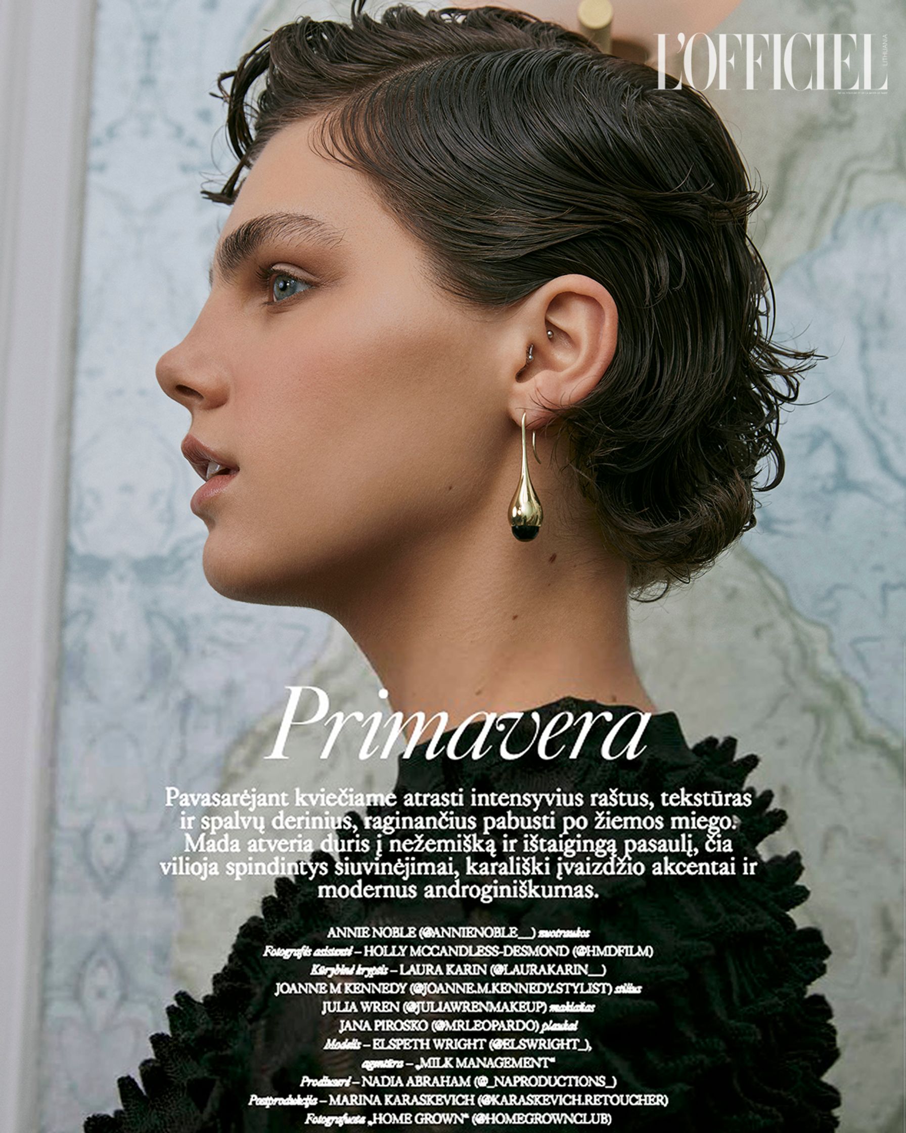 an image of a woman wearing earrings in a magazine