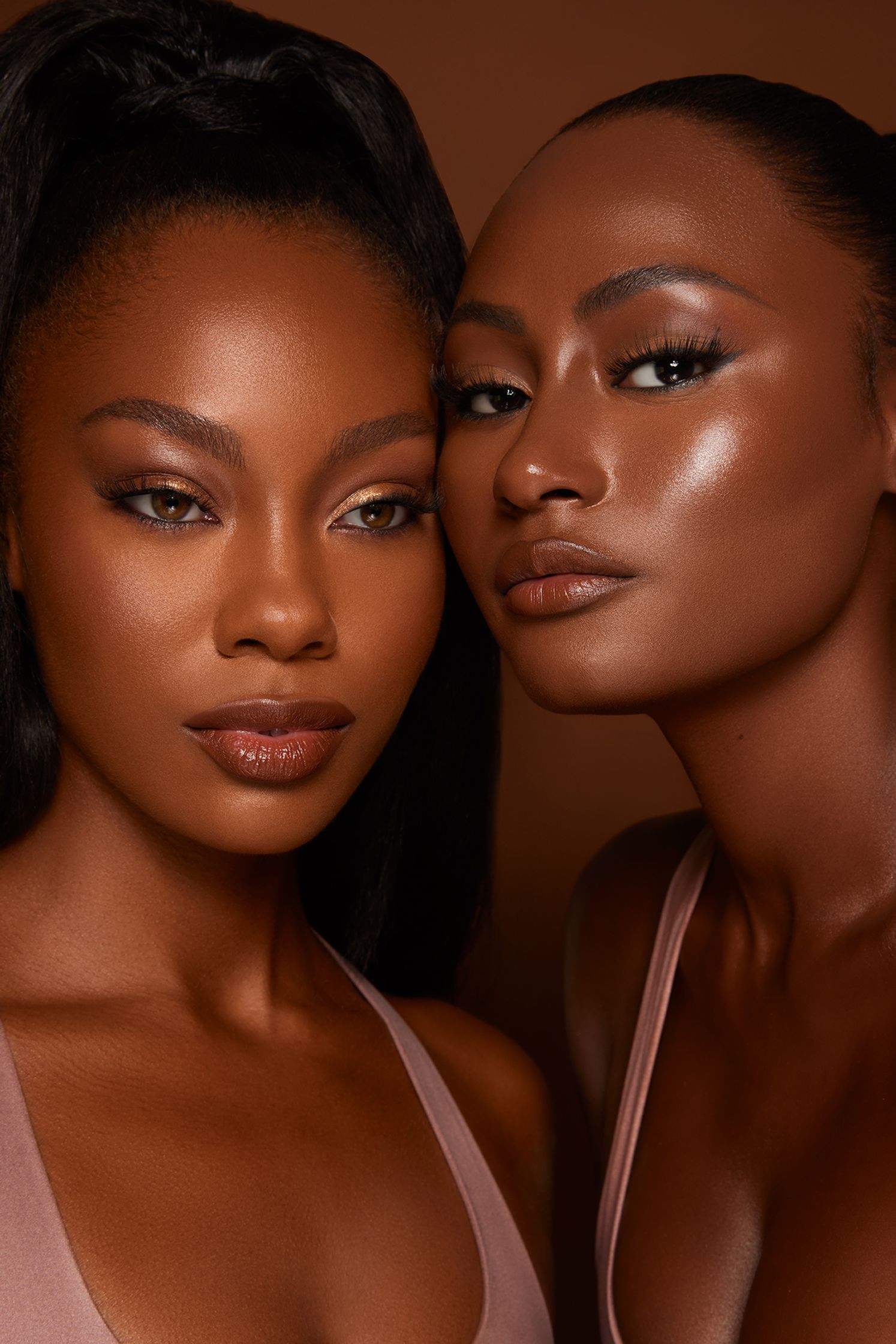 two black women posing for a photo