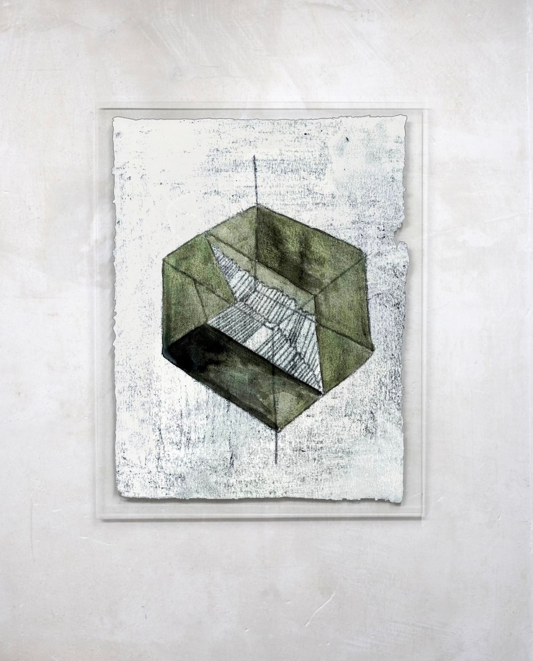 a drawing of a green cube on a white wall