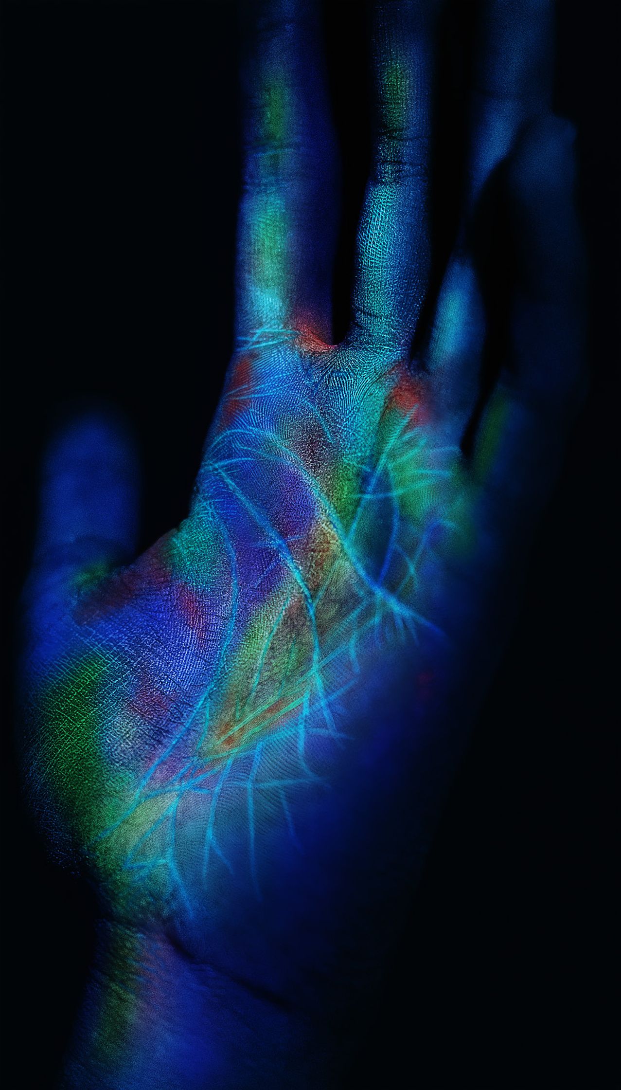 an image of a person's hand in the dark post production