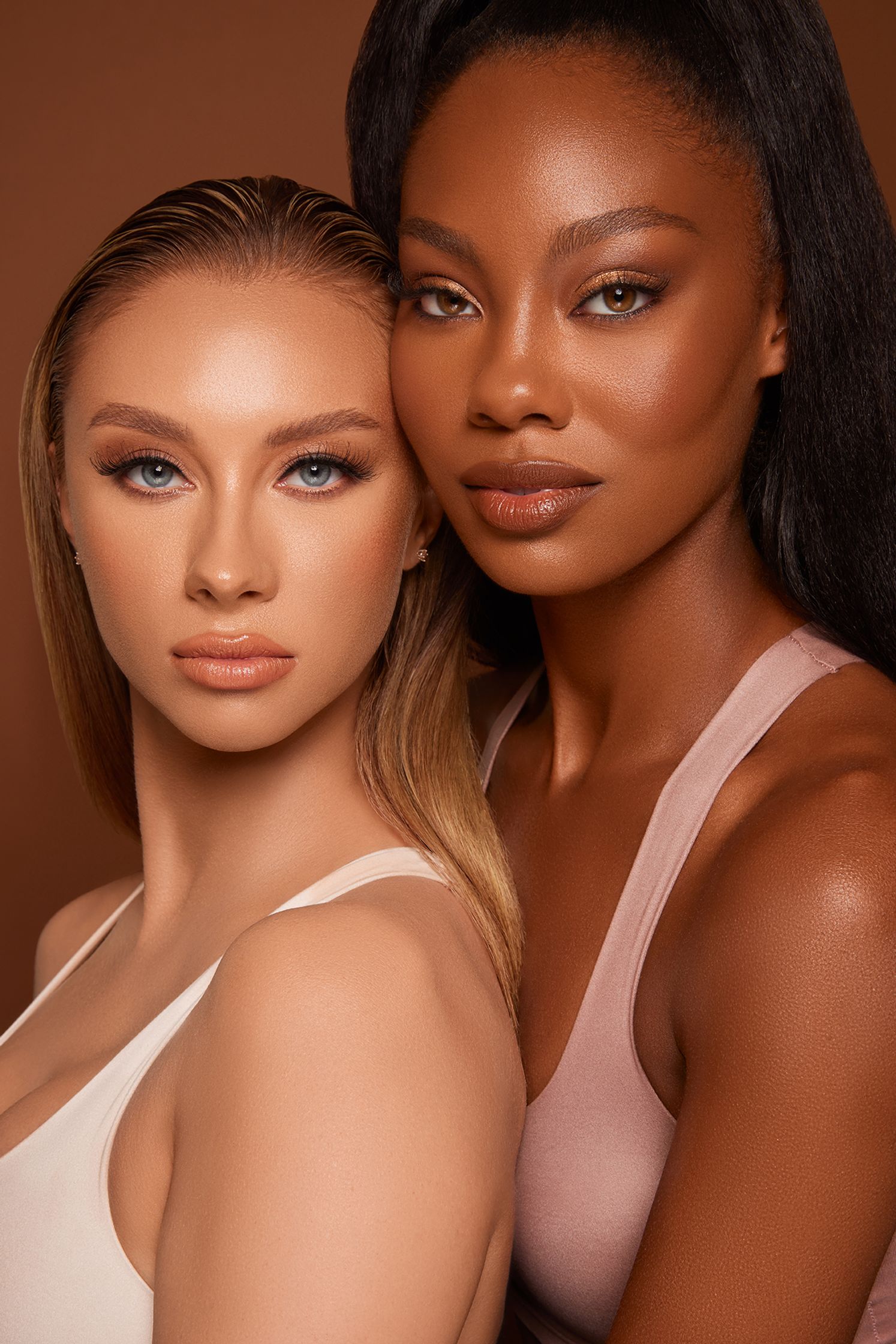 two black women posing for a photo