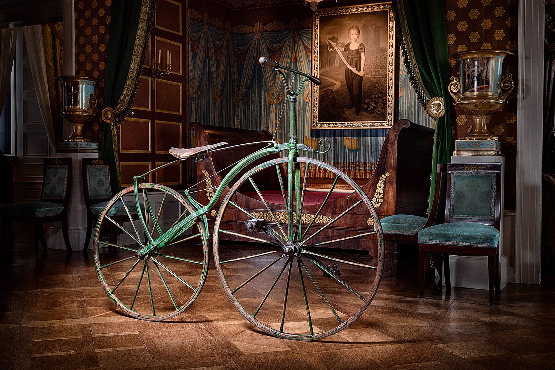 a green bicycle on display in a room product Post Production