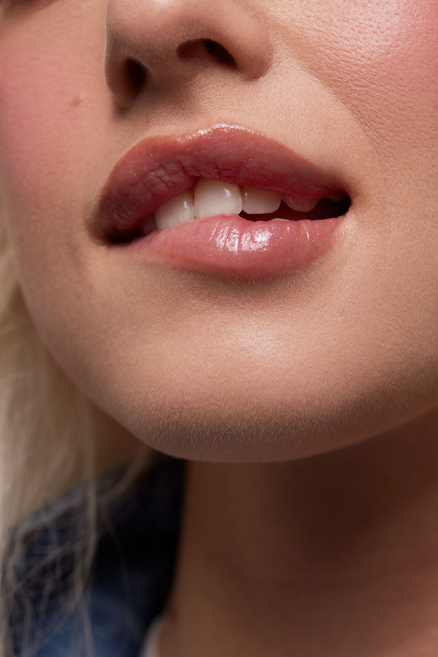 a close up of a woman with blond hair