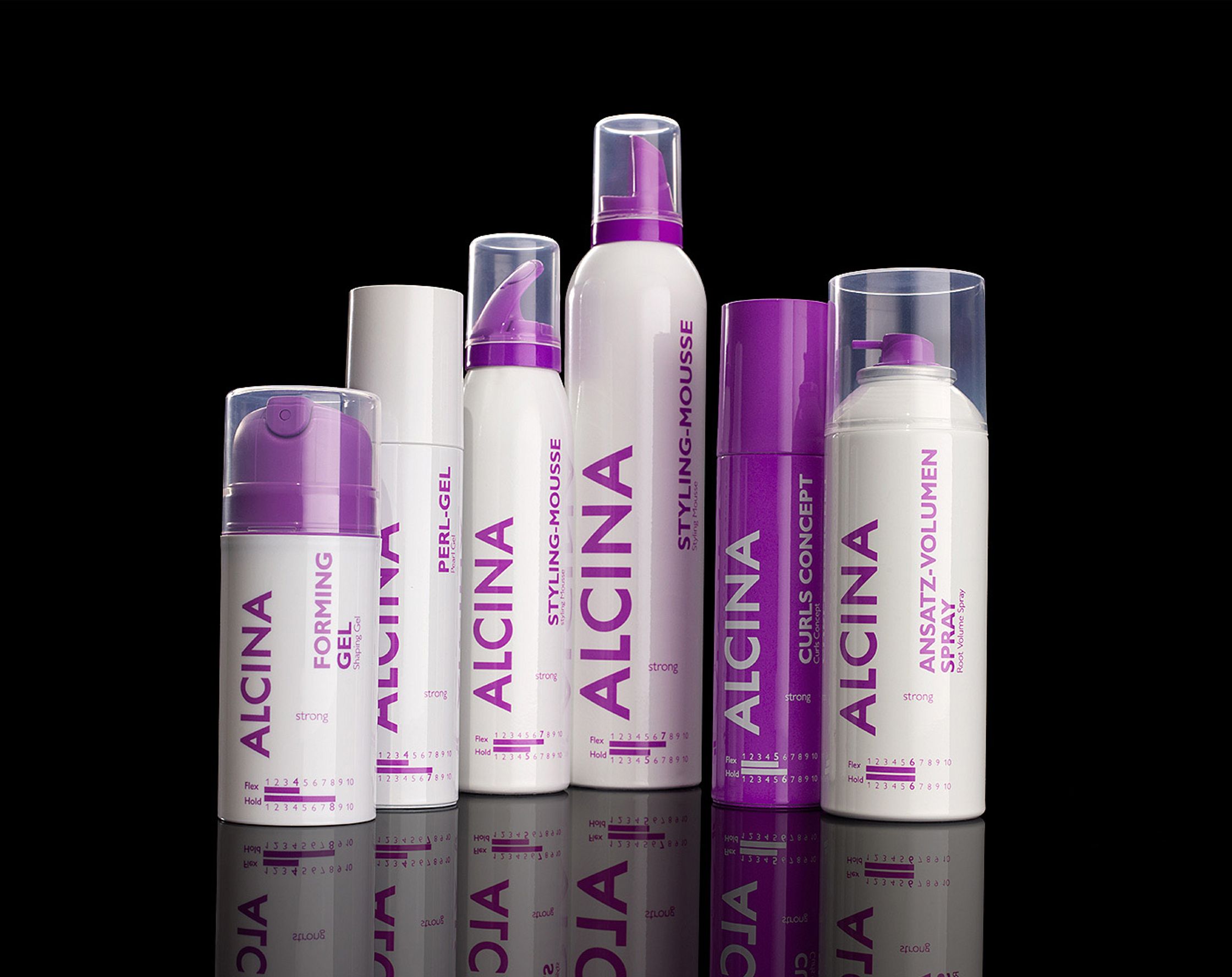 a group of purple hair care products on a black background retouch cosmetic