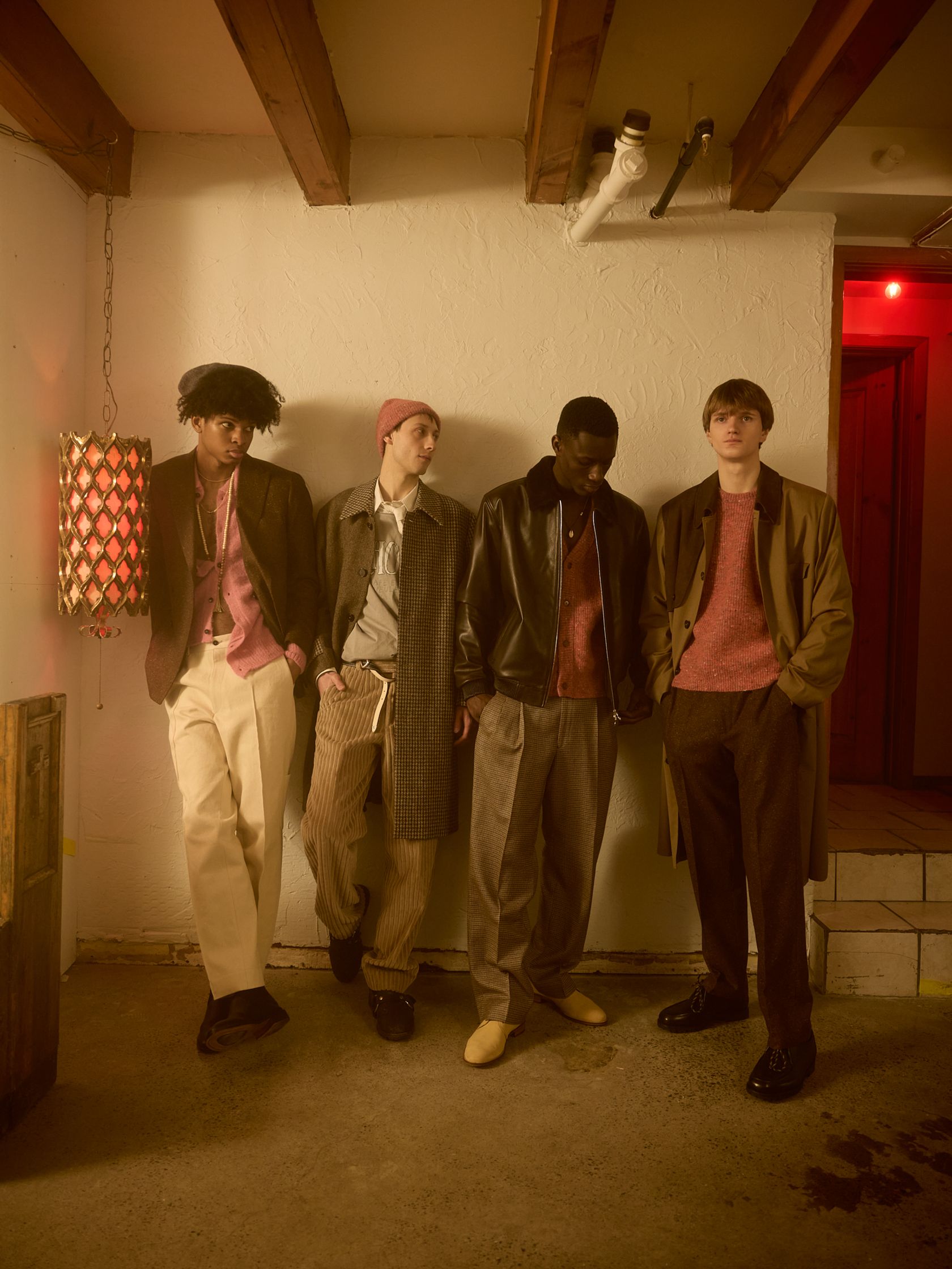 a group of young men standing in a room