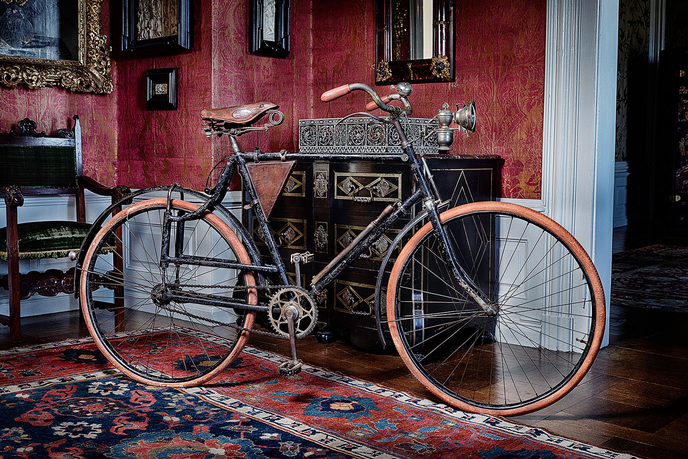 a bicycle sitting on a rug in a room product Post Production