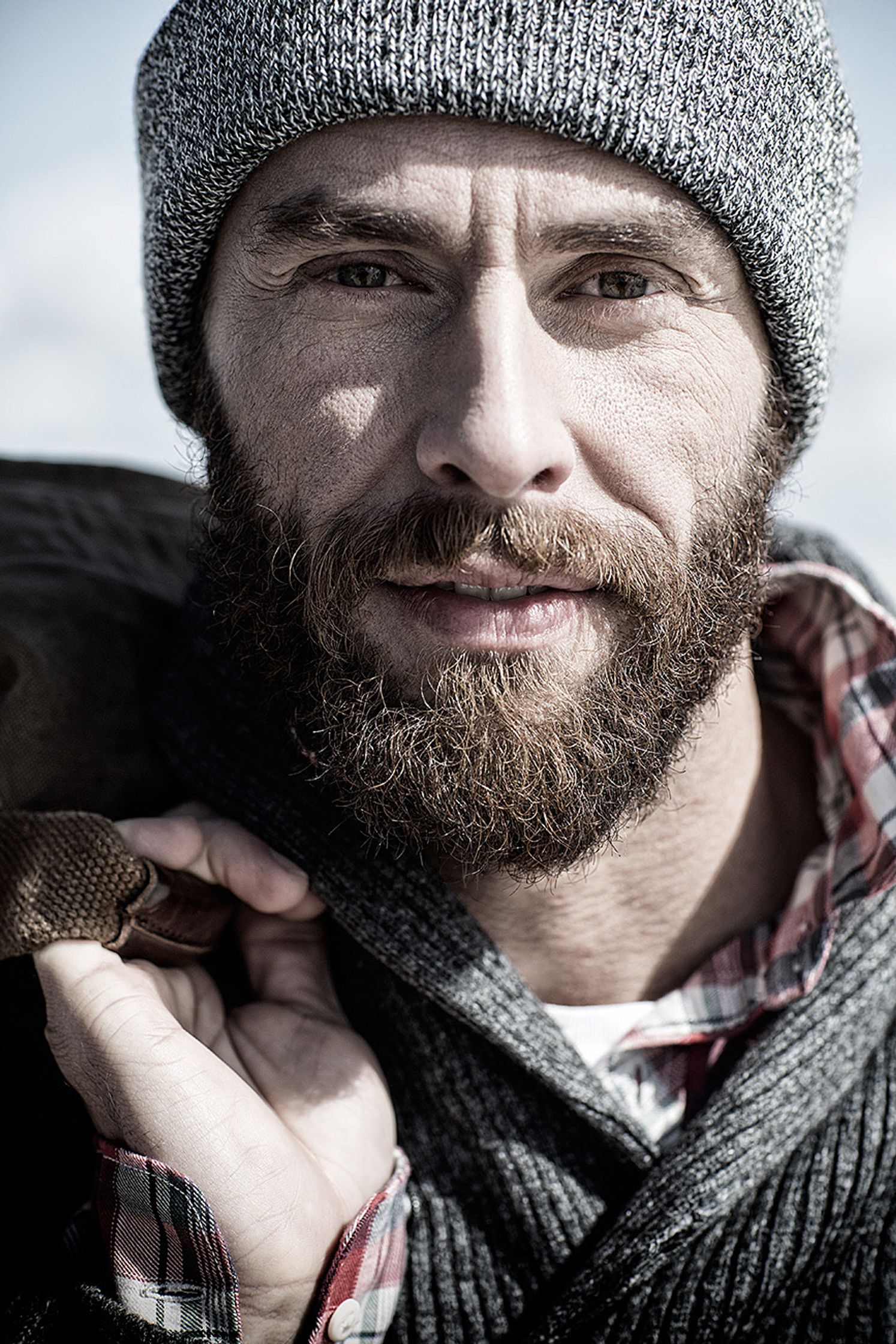 a bearded man with a beard post production image campaign