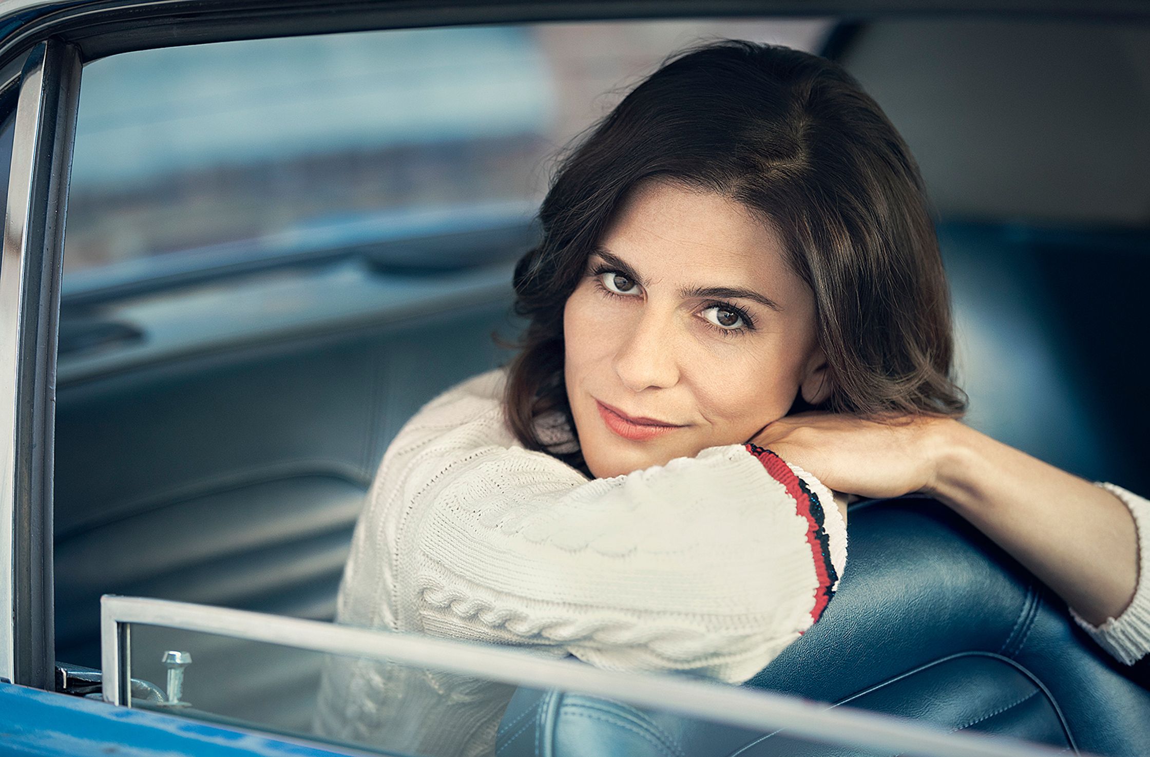 christina hecke sitting in the back seat of a car
post production by glamtouch