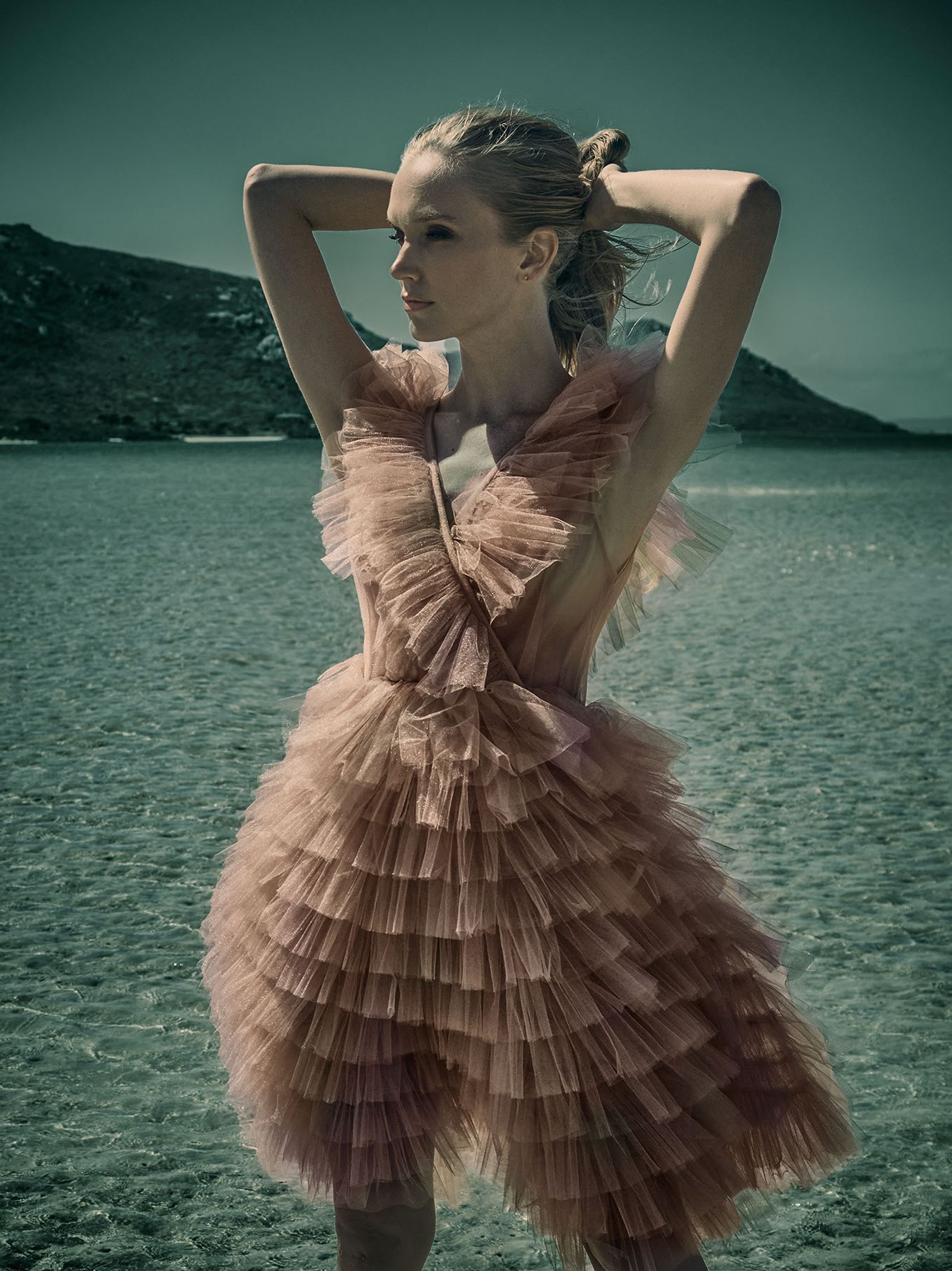 taylor swift in a pink tulle dress on the beach